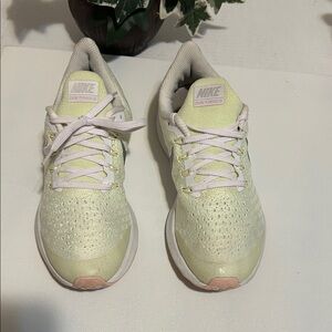 Nike Kids Light Green Athletic Shoes with Pink Accents